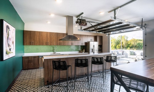 Kitchen and bar space for residents with access to outdoors